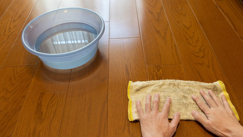 Wipe the wooden floor with a wet cloth