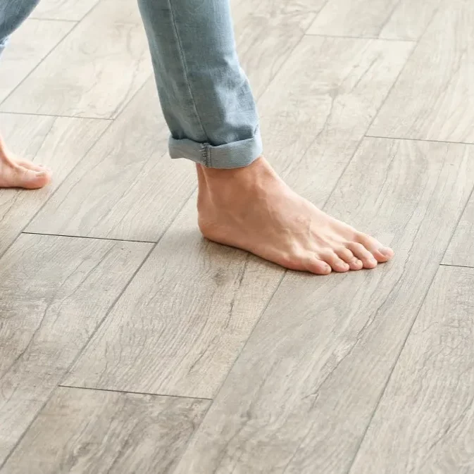 walking-on-laminate-flooring | Shans Carpets And Fine Flooring